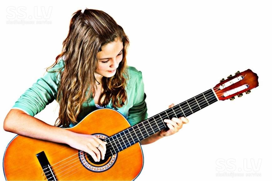 Обучение игре на гитаре в домашних условиях
